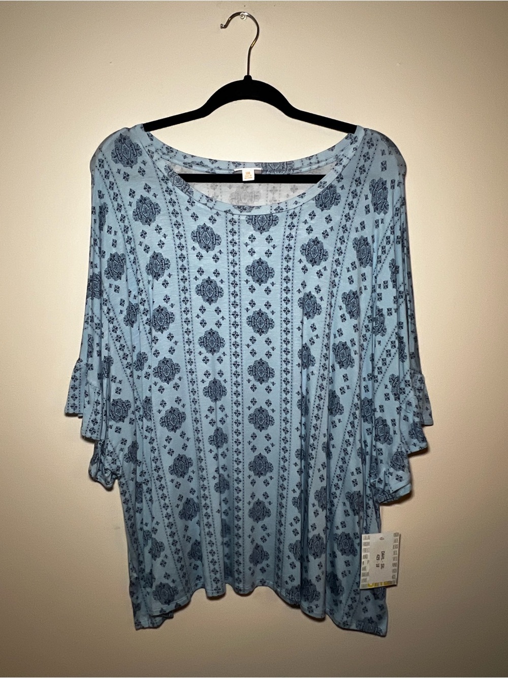 LuLaRoe Dahl Light Blue w/ Print Ruffle Sleeve Top